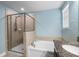 Relaxing main bathroom offers a separate shower and soaking tub at 1821 Hawks View Dr, Ruskin, FL 33570