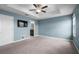 Spacious main bedroom features a tray ceiling and a ceiling fan at 1821 Hawks View Dr, Ruskin, FL 33570