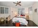 Bedroom with a ceiling fan, seating area and plenty of natural light at 2 Seaside Ln # 203, Belleair, FL 33756