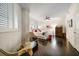 Bedroom with a ceiling fan, and natural lighting from large windows at 2 Seaside Ln # 203, Belleair, FL 33756