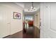 Inviting foyer with dark hardwood floors and an open view to the living area at 2 Seaside Ln # 203, Belleair, FL 33756
