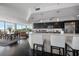 Kitchen and dining area with breakfast bar and views at 2 Seaside Ln # 203, Belleair, FL 33756