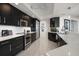 Well-appointed kitchen with stainless steel appliances, ample counter space, and modern cabinetry for all your cooking needs at 2 Seaside Ln # 203, Belleair, FL 33756
