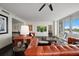 Spacious living room with comfortable seating and large windows offering scenic views at 2 Seaside Ln # 203, Belleair, FL 33756