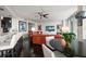 Open-concept living space with bar seating, perfect for entertaining at 2 Seaside Ln # 203, Belleair, FL 33756