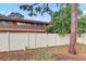 Fenced backyard with a privacy fence, offering a secure and private outdoor space at 2078 Sunset Point Rd # 83, Clearwater, FL 33765