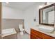 This bathroom features a large sink and a tub at 2078 Sunset Point Rd # 83, Clearwater, FL 33765