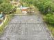 Aerial view of well-maintained community tennis courts, perfect for recreation and fitness at 2078 Sunset Point Rd # 83, Clearwater, FL 33765