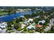 Picturesque neighborhood aerial featuring lush green landscaping, waterfront properties, and community charm at 2205 N Riverside Dr, Tampa, FL 33602