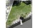 Aerial shot of empty grass lot with dock along waterfront, perfect for building a dream home at 2205 N Riverside Dr, Tampa, FL 33602