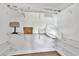 Walk-in closet with white wire shelving and bright natural light at 2205 N Riverside Dr, Tampa, FL 33602