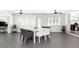 Open dining area with modern table and seating, featuring views to other living spaces at 2205 N Riverside Dr, Tampa, FL 33602