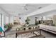 View of a modern living room and kitchen with neutral colors and decor, and an open floor plan at 2205 N Riverside Dr, Tampa, FL 33602