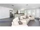 Inviting living area with neutral tones, recessed lighting, and open access to the kitchen at 2205 N Riverside Dr, Tampa, FL 33602