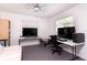 Office space with neutral decor, two desks, and a comfortable sitting area at 2205 N Riverside Dr, Tampa, FL 33602