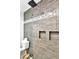 Elegant glass shower with tiled walls and built-in shelving niches at 2205 N Riverside Dr, Tampa, FL 33602