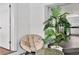 A sitting area near the entry has a decorative chair, table, and plant at 2205 N Riverside Dr, Tampa, FL 33602