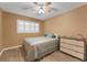 Cozy bedroom with shuttered windows, and a warm color palette at 2256 Philippine Dr # 24, Clearwater, FL 33763