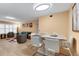 View shows a dining area with seating for six open to the living room at 2256 Philippine Dr # 24, Clearwater, FL 33763