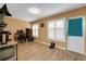 Inviting living room area with natural light, wood-look floors and neutral-toned walls at 2256 Philippine Dr # 24, Clearwater, FL 33763