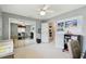 This bedroom offers mirrored closet doors and access to other rooms in the home at 2418 Cardwell Way, Sarasota, FL 34231