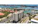 Panoramic aerial view showcasing the building, marina, and city skyline at 255 Dolphin Pt # 207, Clearwater Beach, FL 33767
