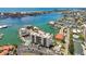 Beautiful waterfront condo complex with pool, boat docks, and stunning coastal views at 255 Dolphin Pt # 207, Clearwater Beach, FL 33767