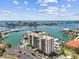 Beautiful aerial view of a waterfront condo community that features stunning water views and convenient boat access at 255 Dolphin Pt # 207, Clearwater Beach, FL 33767