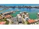 Beautiful aerial view of the waterfront property, marina, and ocean at 255 Dolphin Pt # 207, Clearwater Beach, FL 33767