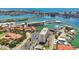 Scenic aerial view showcasing the property with a marina and waterfront at 255 Dolphin Pt # 207, Clearwater Beach, FL 33767