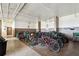 Secured bike storage area with multiple bikes and storage racks at 255 Dolphin Pt # 207, Clearwater Beach, FL 33767