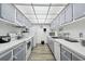 Efficient kitchen features a range of appliances and ample cabinet storage at 255 Dolphin Pt # 207, Clearwater Beach, FL 33767