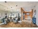Wide lobby area featuring comfortable seating, tiled floors and accents with full-length mirror at 255 Dolphin Pt # 207, Clearwater Beach, FL 33767