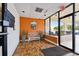 Lobby with tiled floors, accent bench, plants, and well-lit entry at 255 Dolphin Pt # 207, Clearwater Beach, FL 33767