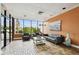 Comfortable lobby with large window to view landscaping, seating, and accent decor at 255 Dolphin Pt # 207, Clearwater Beach, FL 33767