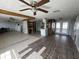 Spacious living room with tile floors and natural light from the windows at 2619 Albion St, Holiday, FL 34691