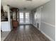 Spacious living room with tile floors and natural light from the windows at 2619 Albion St, Holiday, FL 34691