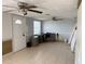 Spacious living room with tile floors and natural light from the windows at 2619 Albion St, Holiday, FL 34691