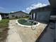 A kidney-shaped pool is the focal point of this backyard at 2619 Albion St, Holiday, FL 34691