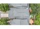 Aerial view of the home showcasing the roof, landscaping, and surrounding neighborhood at 3029 Brookfield Ln, Clearwater, FL 33761