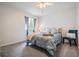 Cozy bedroom featuring plush bedding, decorative pillows, and soft window treatments at 3029 Brookfield Ln, Clearwater, FL 33761