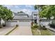 Beautiful home featuring a 2-car garage and meticulously maintained landscaping at 3029 Brookfield Ln, Clearwater, FL 33761