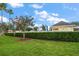 Community pool is surrounded by lush foliage providing a tranquil setting at 3137 Banyan Hill Ln, Land O Lakes, FL 34639