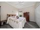 Bright bedroom with comfortable bed, dresser, and closet perfect for relaxation at 3137 Banyan Hill Ln, Land O Lakes, FL 34639