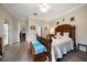 Spacious bedroom with comfortable bed, stylish furniture, and ample natural light at 3137 Banyan Hill Ln, Land O Lakes, FL 34639