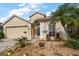 Charming front exterior with a well-kept lawn and inviting curb appeal at 3137 Banyan Hill Ln, Land O Lakes, FL 34639