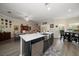 Bright open concept kitchen with a center island and stainless steel appliances at 3137 Banyan Hill Ln, Land O Lakes, FL 34639