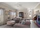 Cozy living room with plush seating, natural light, and modern décor at 3137 Banyan Hill Ln, Land O Lakes, FL 34639