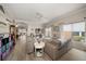 Spacious living room featuring luxury vinyl floors and abundant natural light at 3137 Banyan Hill Ln, Land O Lakes, FL 34639