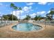 Sparkling community pool is surrounded by lounge chairs for relaxation and enjoyment at 3137 Banyan Hill Ln, Land O Lakes, FL 34639